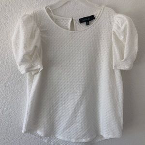 Woman’s white top. Size large